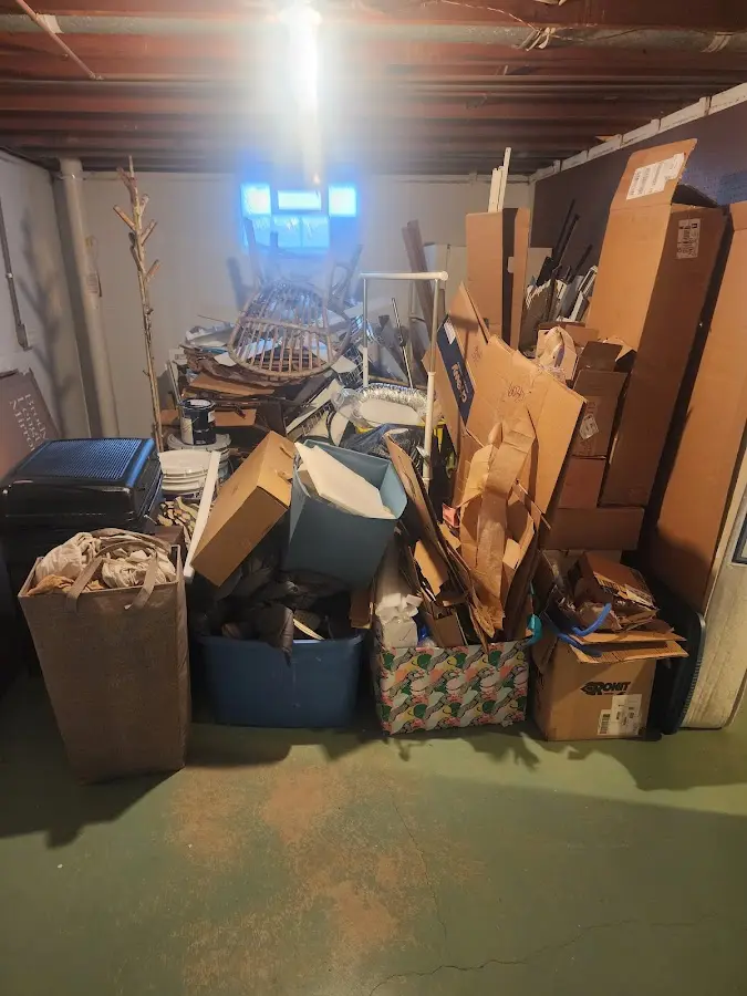 Roll-off dumpster container at job site for Yard Waste Dumpster Rental in Mebane